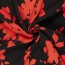 Viskosesatin Blumen - schwarz/orangerot